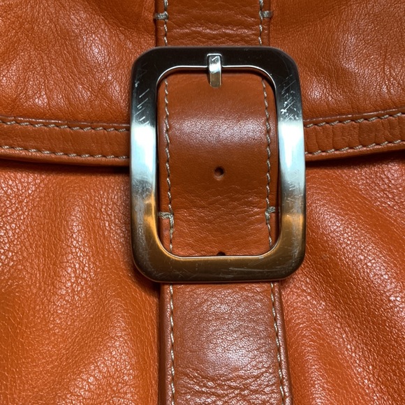 Cole Hahn orange handbag with fringe and silver hardware. - Picture 6 of 16